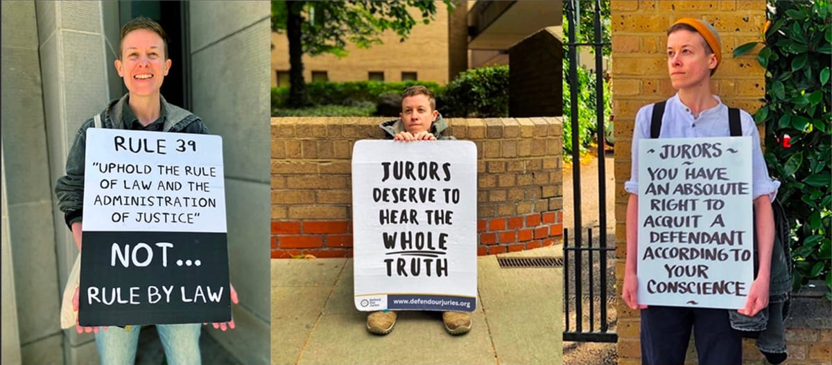 Eel, holding placards in support of Defend Our Juries