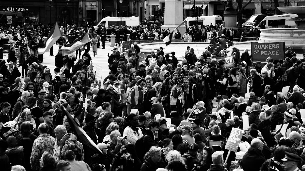 Demonstrators with a 'Quakers for Peace' banner in Trafalgar Square, London